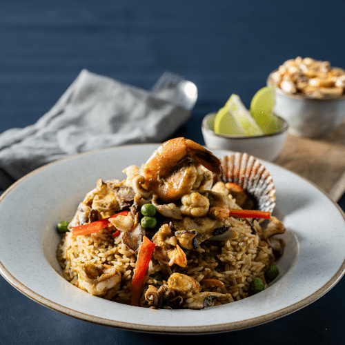 Arroz con mariscos gratinado con parmesano - El Escondite