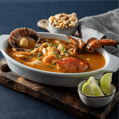 Parihuela peruana tradicional de mariscos - El Escondite